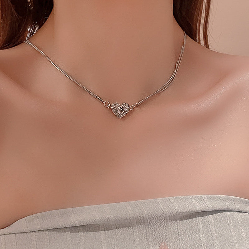 Pendentif cœur magnétique serti de diamants