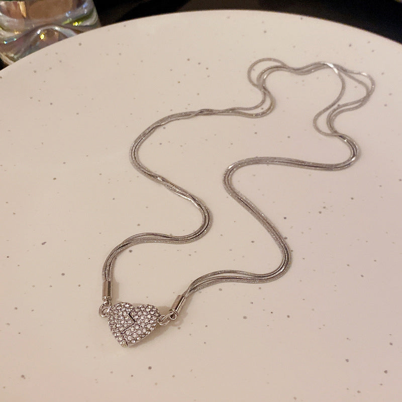 Pendentif cœur magnétique serti de diamants