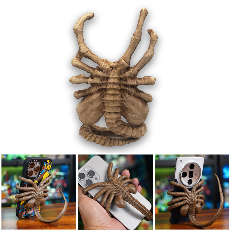 Verschrikkelijke Facehugger-telefoonhouder