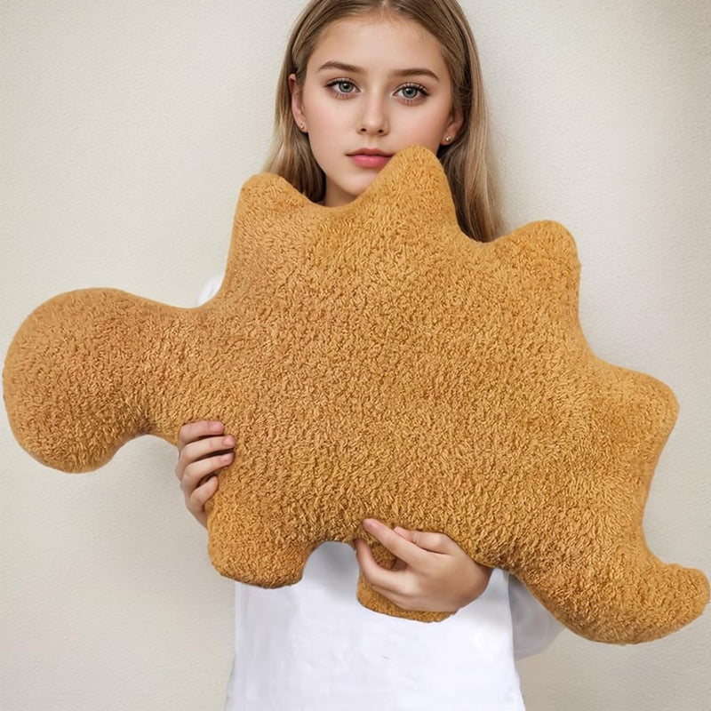 Coussin en peluche dinosaure