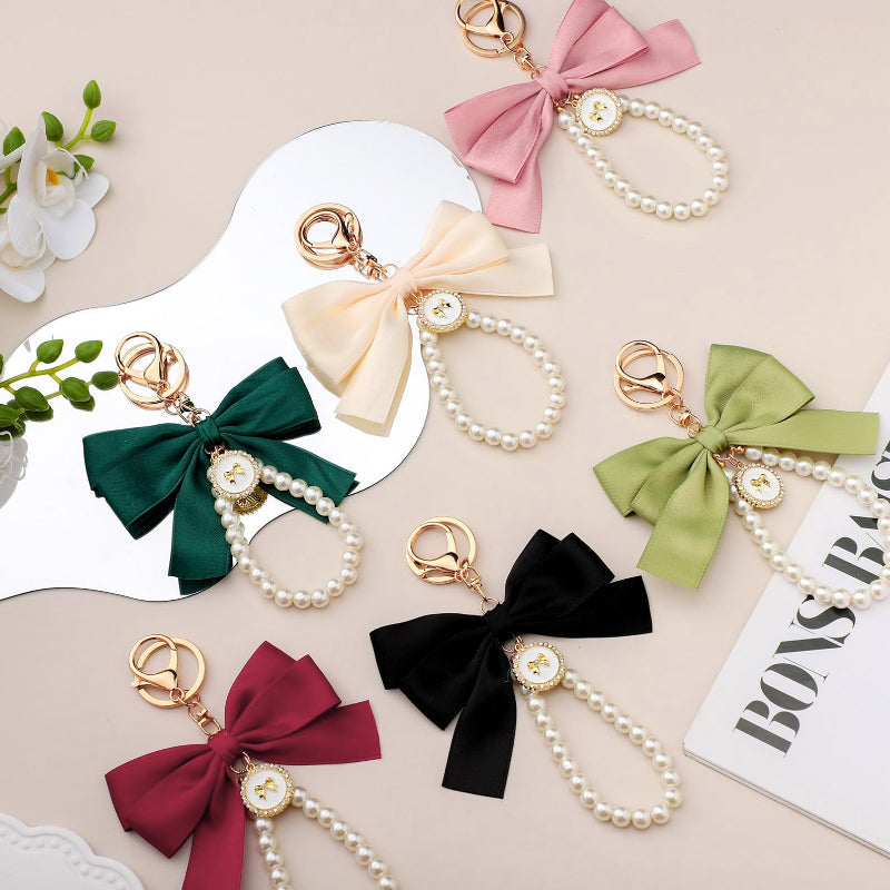 Porte-clés avec bracelet décoré de fausses perles