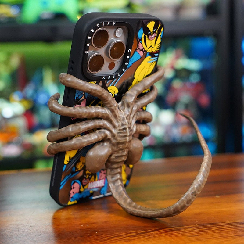 Verschrikkelijke Facehugger-telefoonhouder