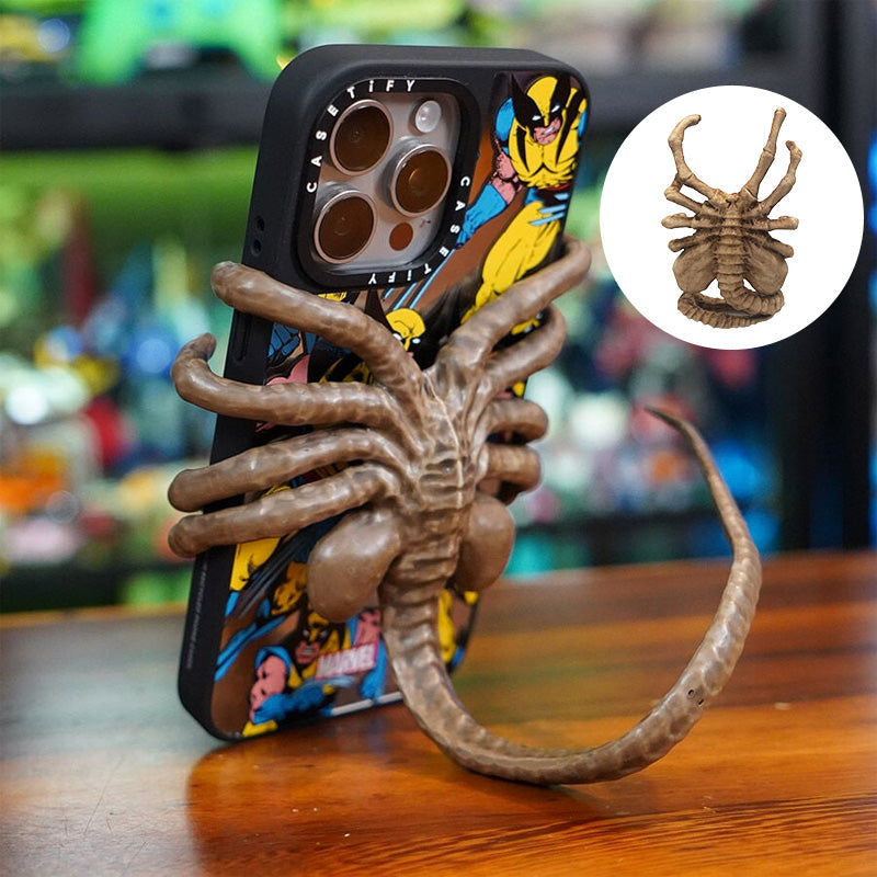 Verschrikkelijke Facehugger-telefoonhouder