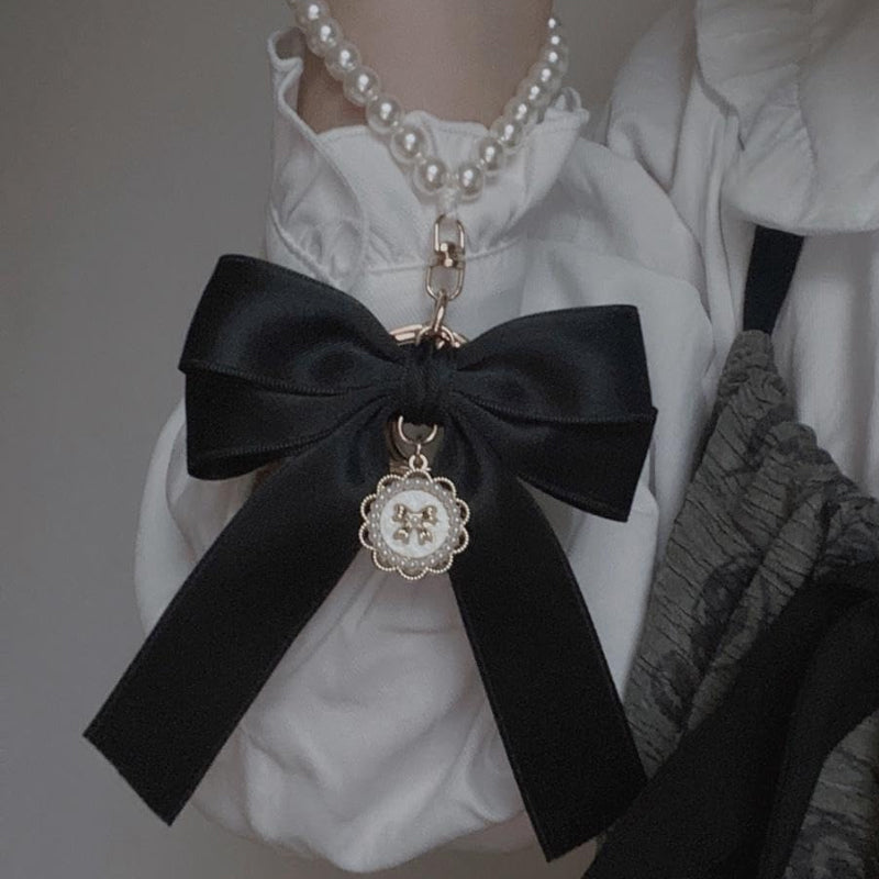Porte-clés avec bracelet décoré de fausses perles