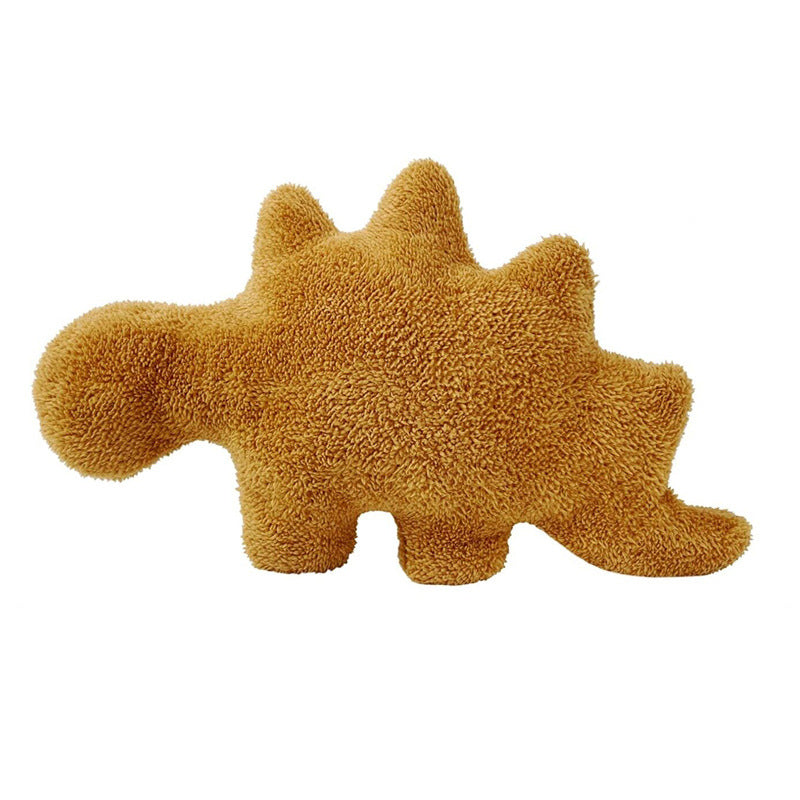 Coussin en peluche dinosaure