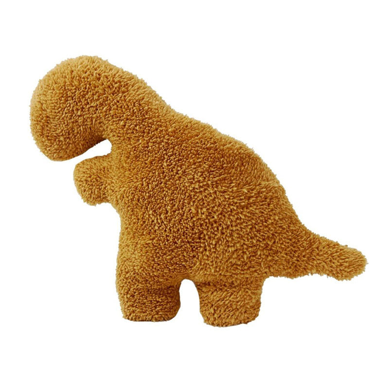 Coussin en peluche dinosaure