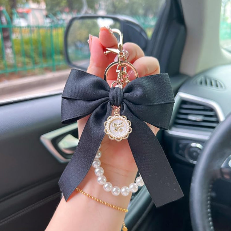 Porte-clés avec bracelet décoré de fausses perles
