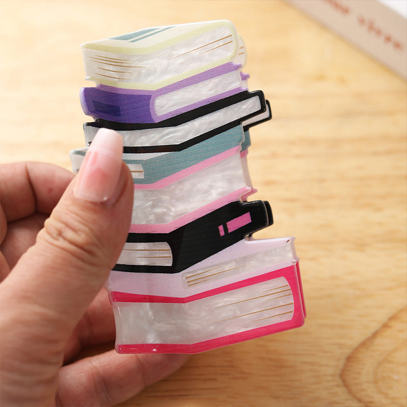 Pince à cheveux livre