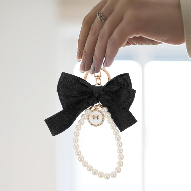 Porte-clés avec bracelet décoré de fausses perles