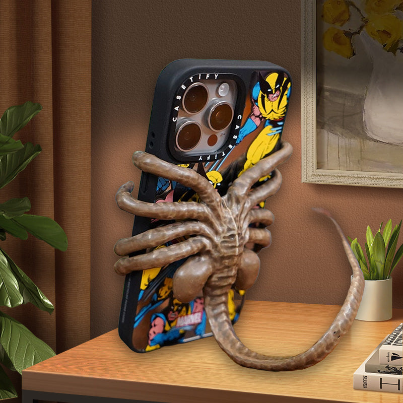 Verschrikkelijke Facehugger-telefoonhouder