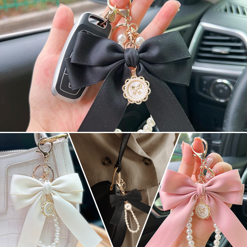 Porte-clés avec bracelet décoré de fausses perles