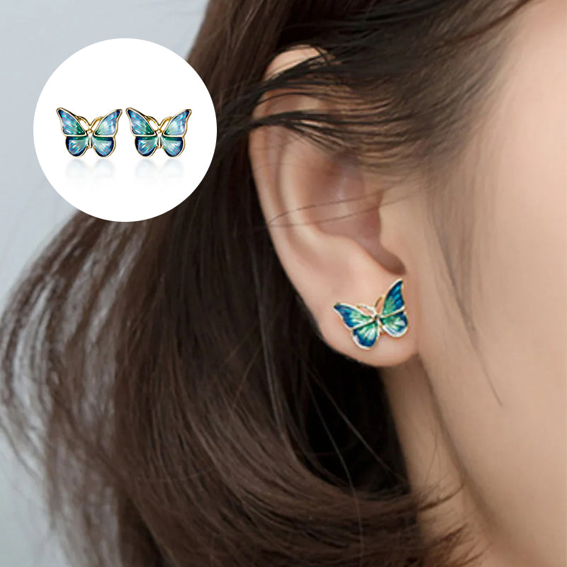 Boucles d'oreilles papillon bleues et dorées
