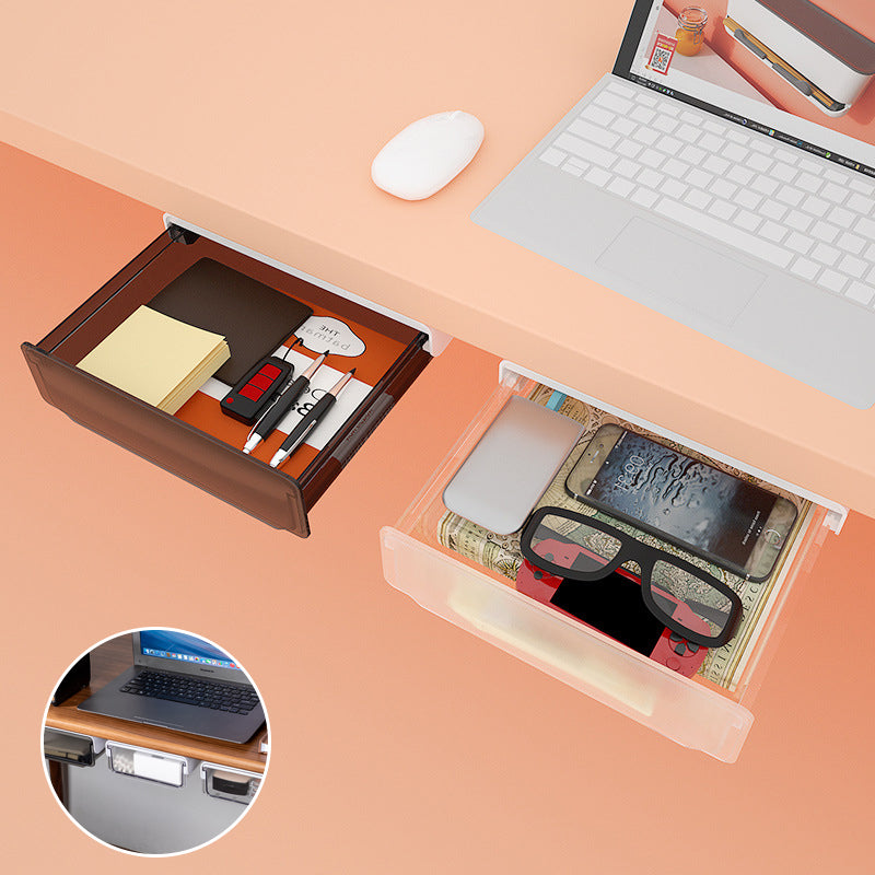 Sous le tiroir du bureau