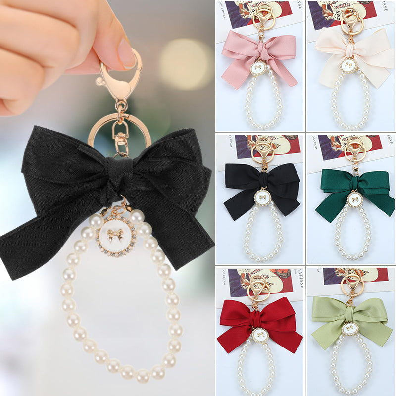 Porte-clés avec bracelet décoré de fausses perles