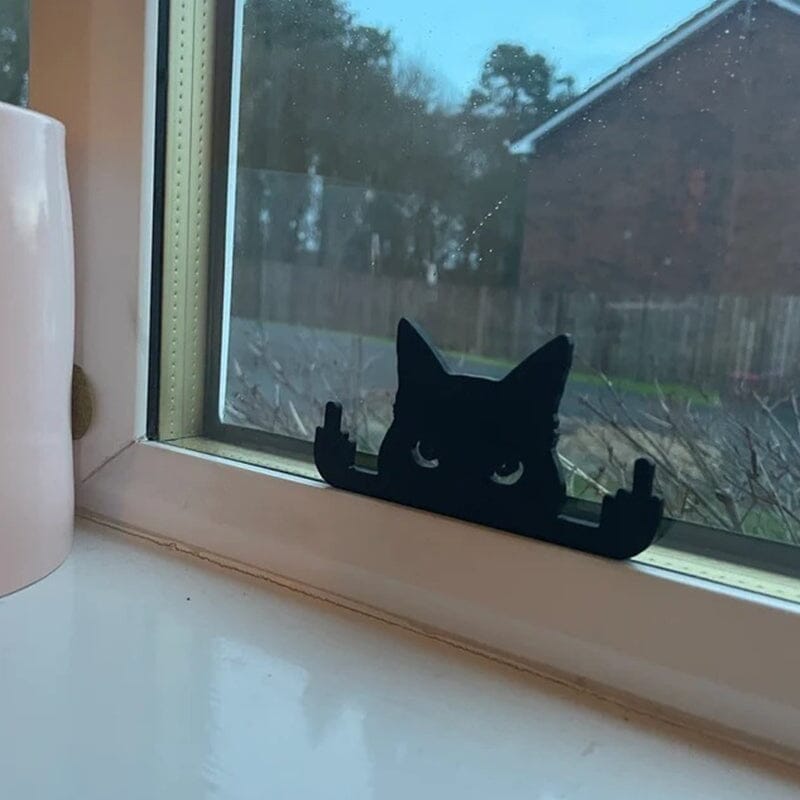 Ornement de chat chat doigt du milieu