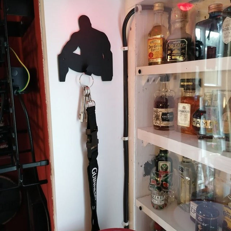 Creatieve sleutelhaak voor aan de muur