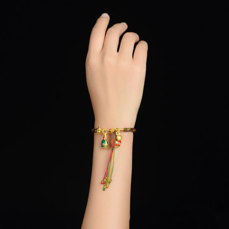Gouden Slikkende Beestarmband