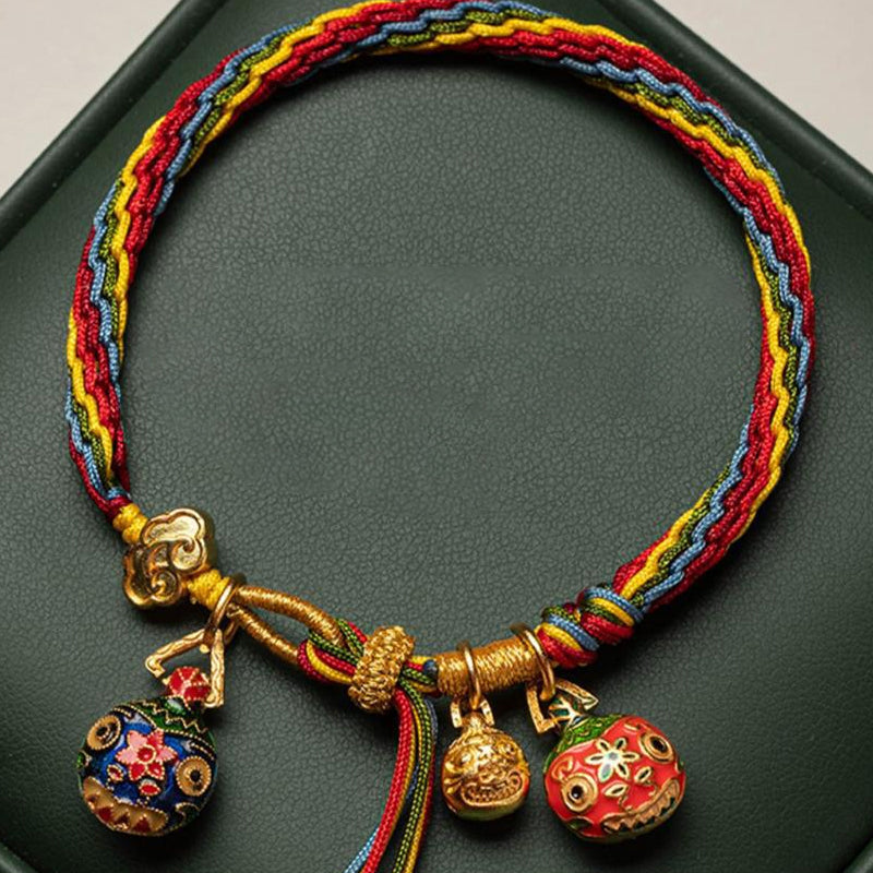 Gouden Slikkende Beestarmband