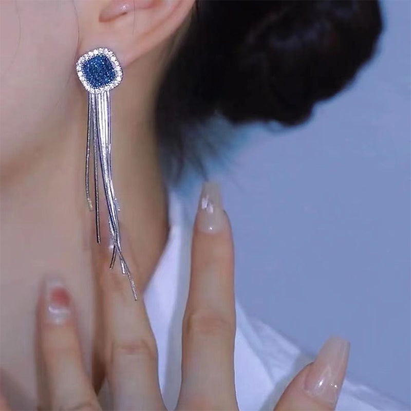 Boucles d'oreilles longues à pampilles