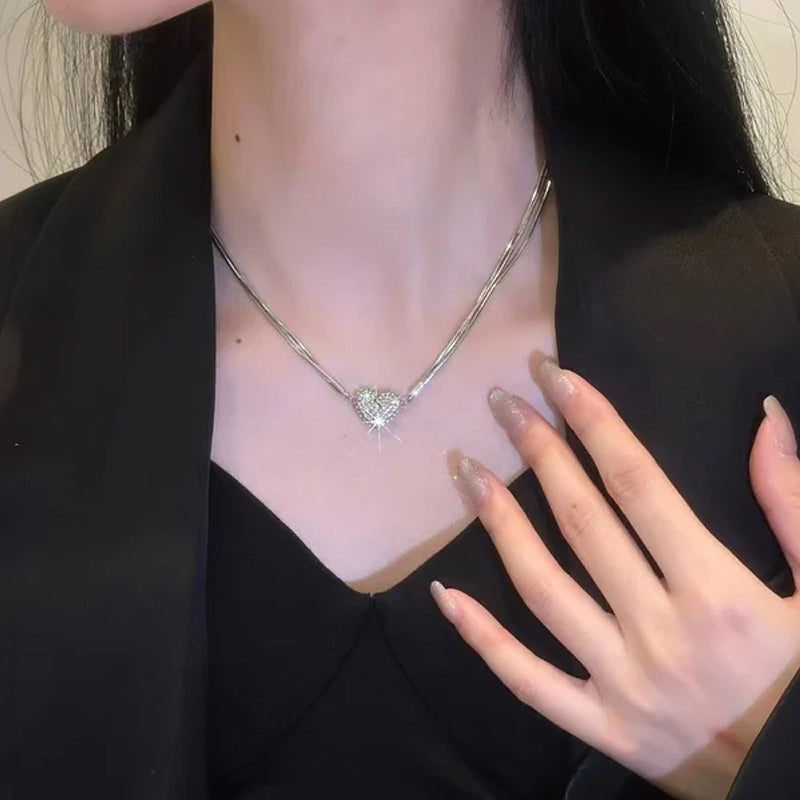 Pendentif cœur magnétique serti de diamants