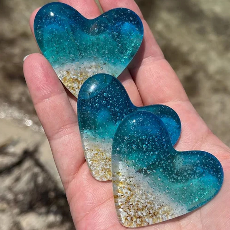Coeur de poche de plage en verre