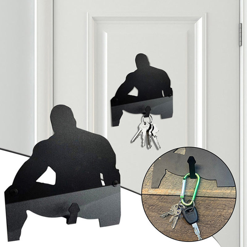 Creatieve sleutelhaak voor aan de muur