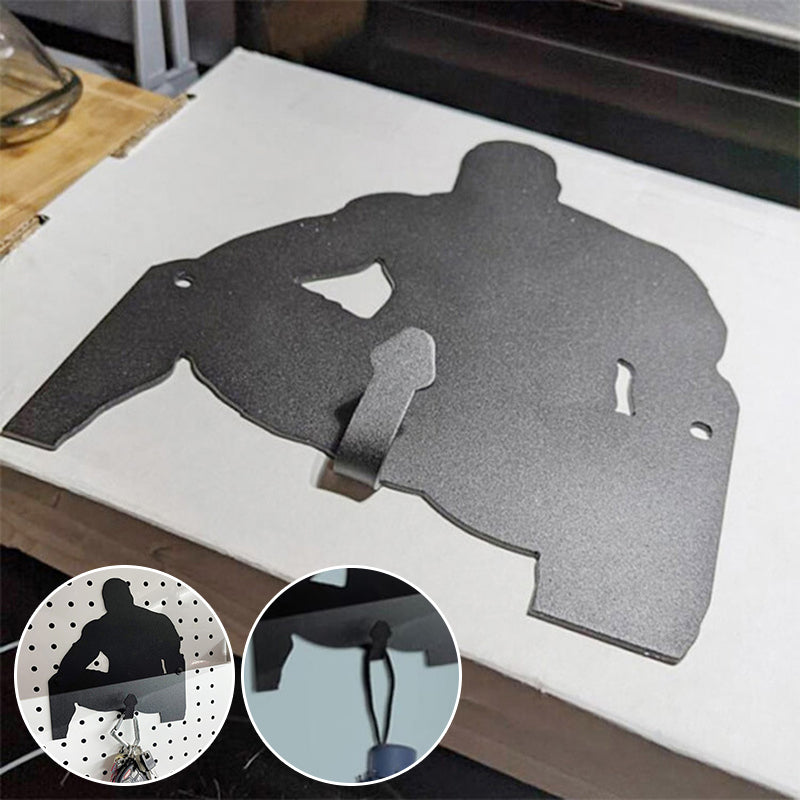 Creatieve sleutelhaak voor aan de muur